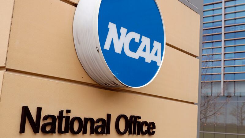 FILE - Signage at the headquarters of the NCAA is viewed in Indianapolis, March 12, 2020....