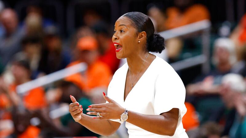 Notre Dame head coach Niele Ivey yells during the first half of an NCAA college basketball...