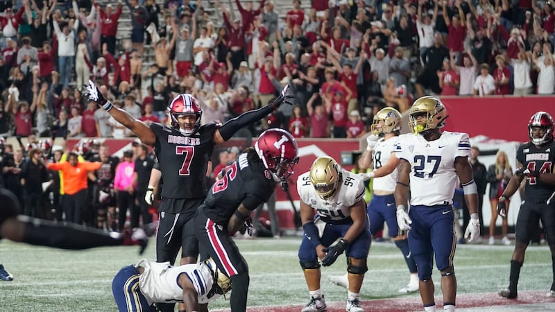 Indiana linebacker Jacob Mangum-Farrar (7) celebrates after his team defeated Akron in four...